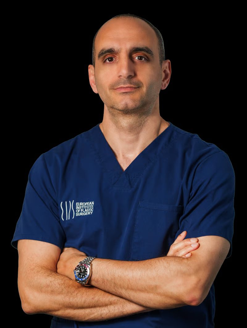 Dr. Demetris Stavrou in surgical scrubs
